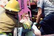 Victim being backboarded.
