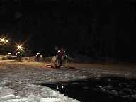 Rescuer & sled approaching the open water.